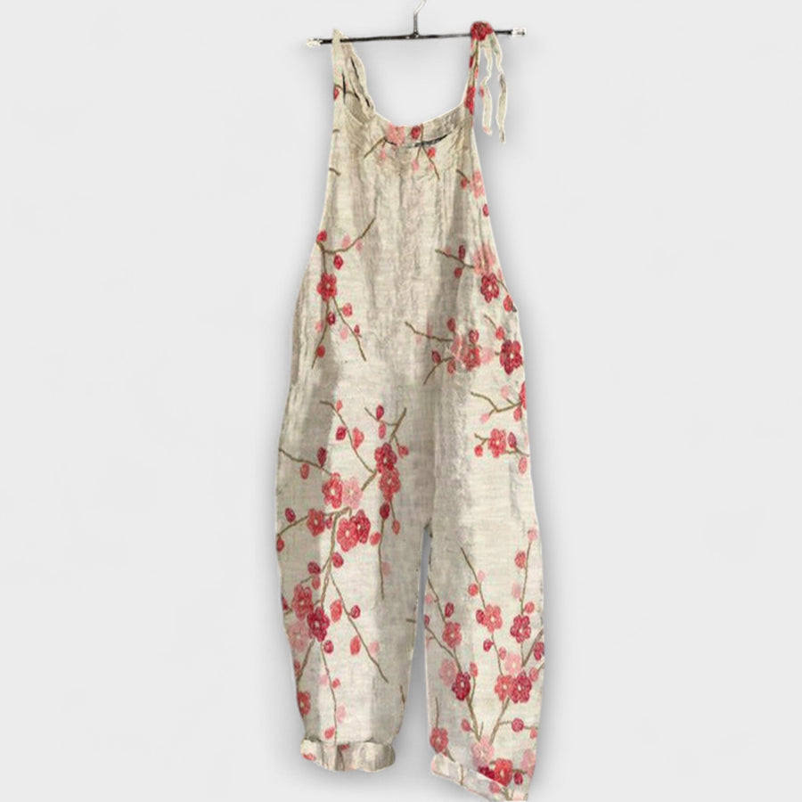 Francesca - Cremefarbene Latzhose mit Blütenmuster